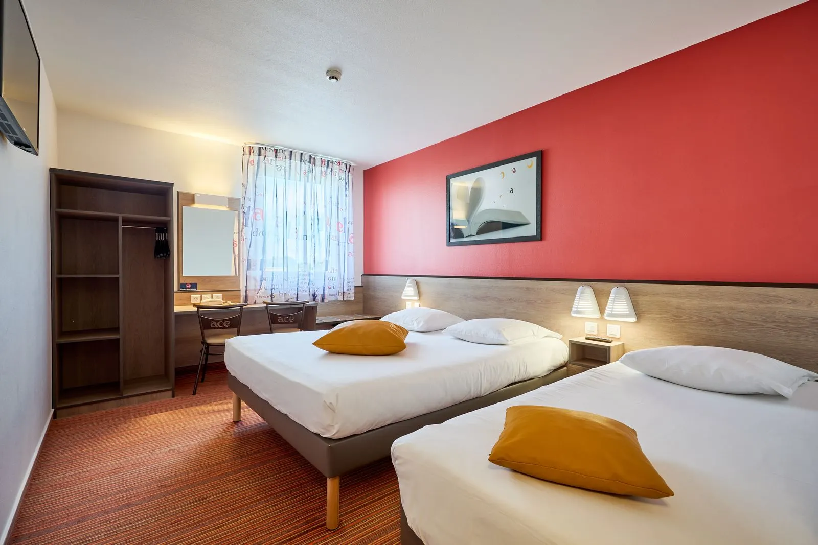Chambre triple de l'Hôtel Goodwood avec lit double et lit simple